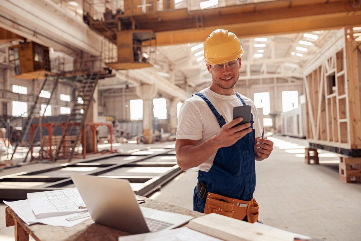 builder using Caterpillar technology at construction site